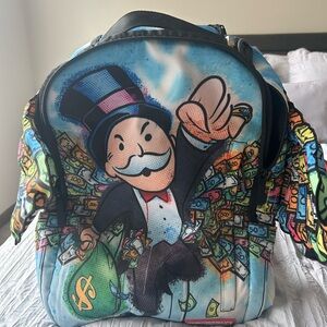 Sprayground Monopoly Money Wings Backpack